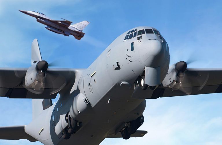 F-16 fighter jet and C-130 cargo airplane in flight