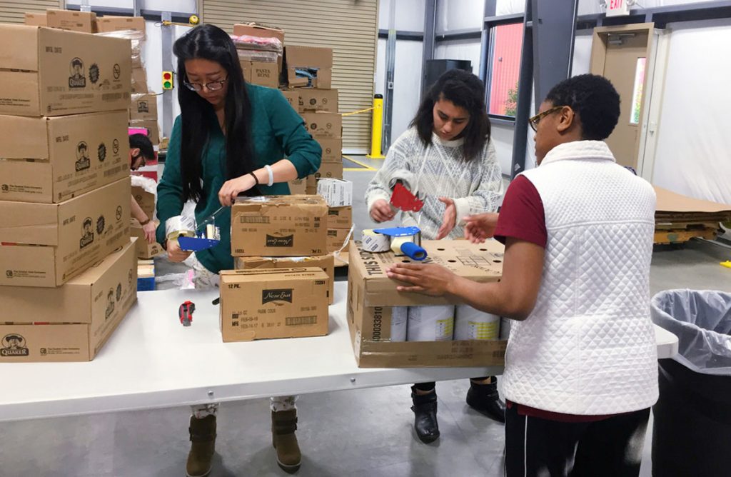Aventure Aviation team members volunteer at the Midwest Food Bank’s Georgia division in Peachtree City