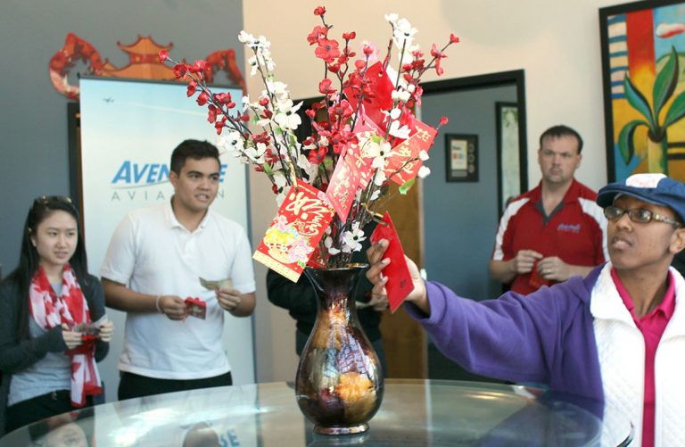 Aventure staff celebrate the Year of the Rooster 2017 at their Atlanta headquarters