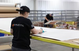 A MRO Crucial worker at work in a large indoor faciliy