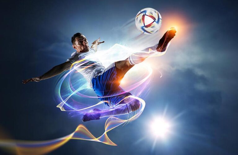 Soccer player kicking soccer ball soaring through the air