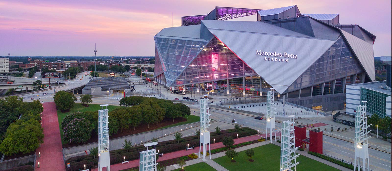 View of Mercedes-Benz Stadium with a beautiful purple sky