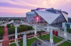 View of Mercedes-Benz Stadium with a beautiful purple sky