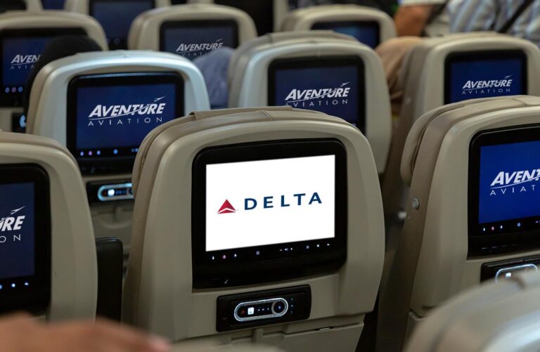 Commercial airline seatback video screens showing logos of Delta Airlines and Aventure Aviation