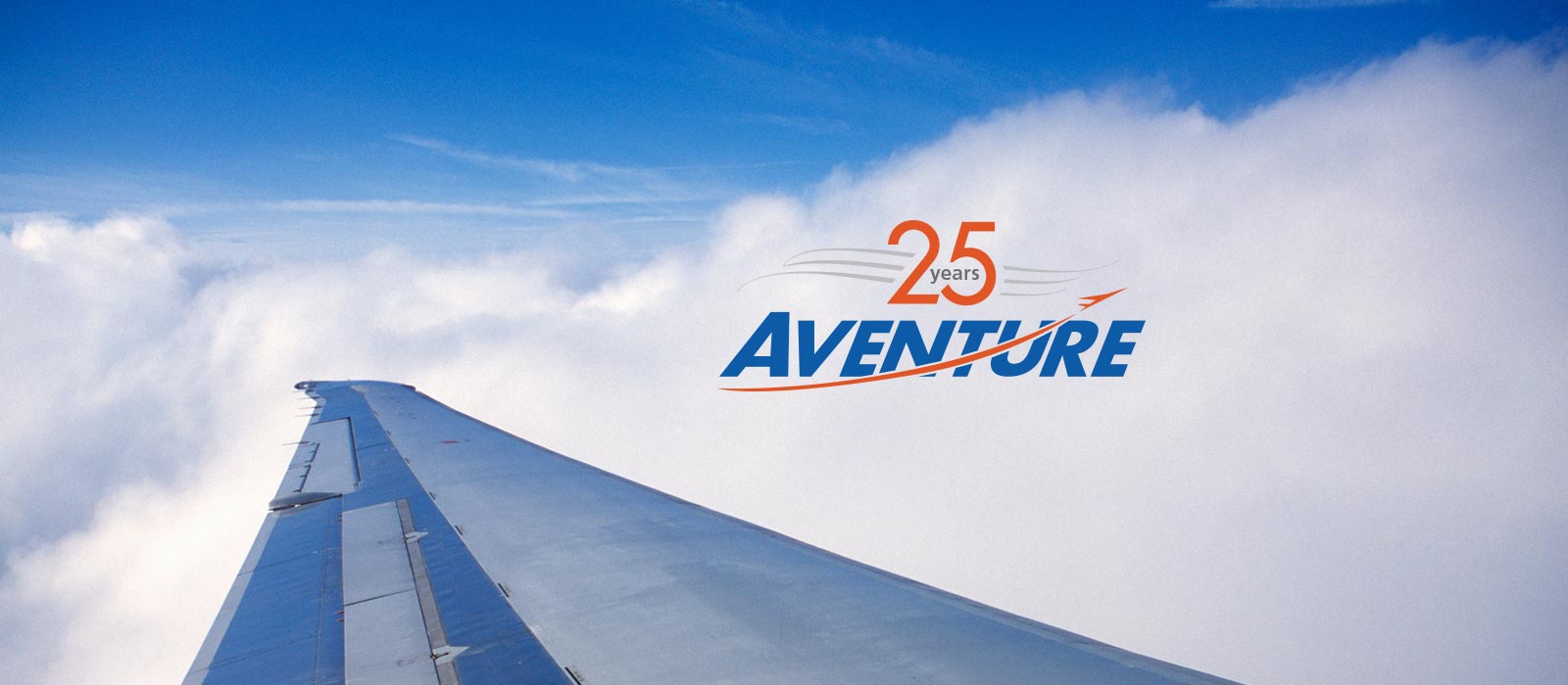 A beautiful blue sky with the Aventure Aviation 25 years logo, and an aircraft wing visible