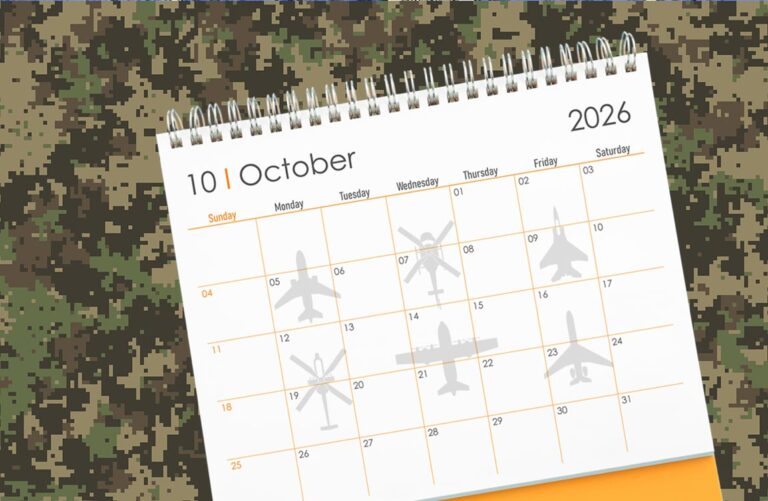 A calendar saying "October 2026" against a camouflag background